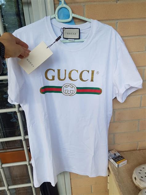 maglia bianca gucci con strisce rosse verdi orizzontali|Magliette Gucci in Bianco .